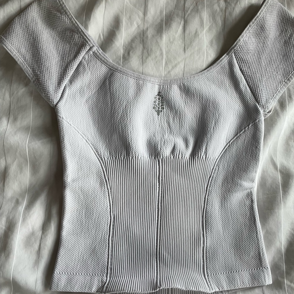 XS Free People Movement Tennis contour top!